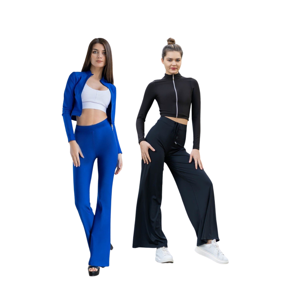 Zwei Frauen präsentieren trendige Outfits: eine in blauer Hose und Jacke, die andere in schwarzer Hose mit weitem Bein und Top.