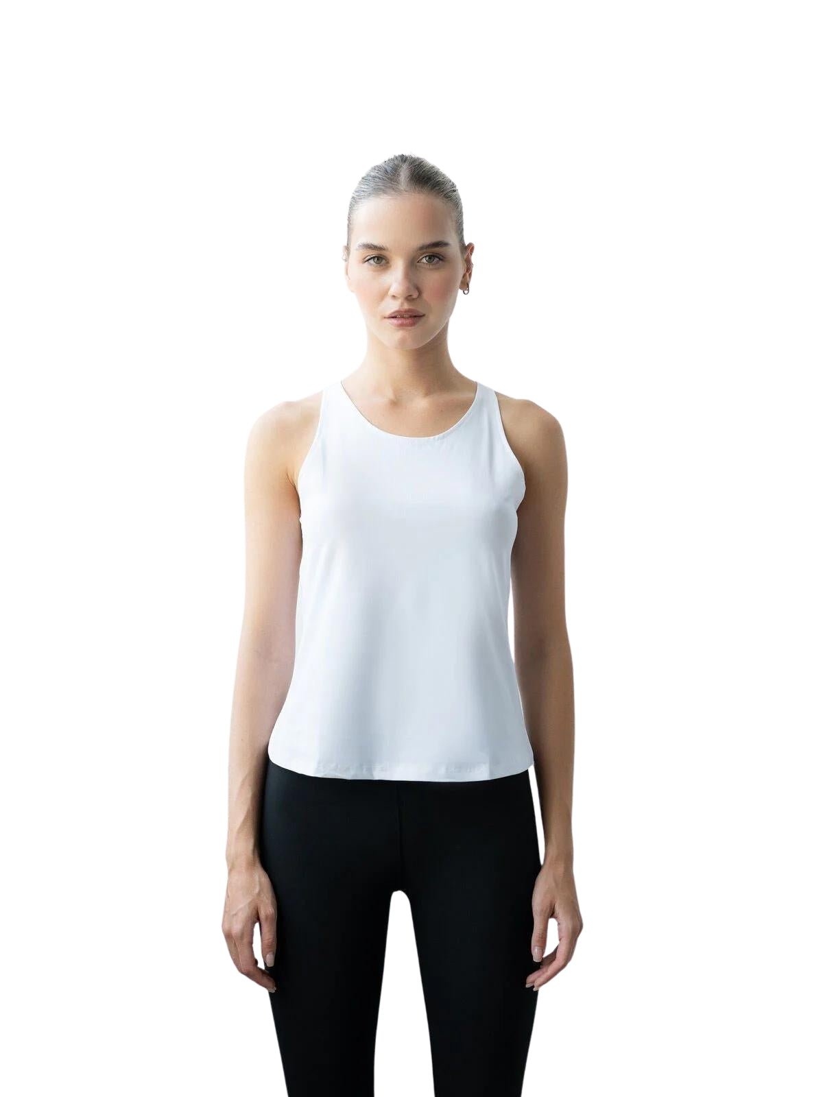Person trägt Lisminas 089 Sport-Top in Weiss und schwarze Leggings, perfekt für Yoga, vor einem schlichten weißen Hintergrund.