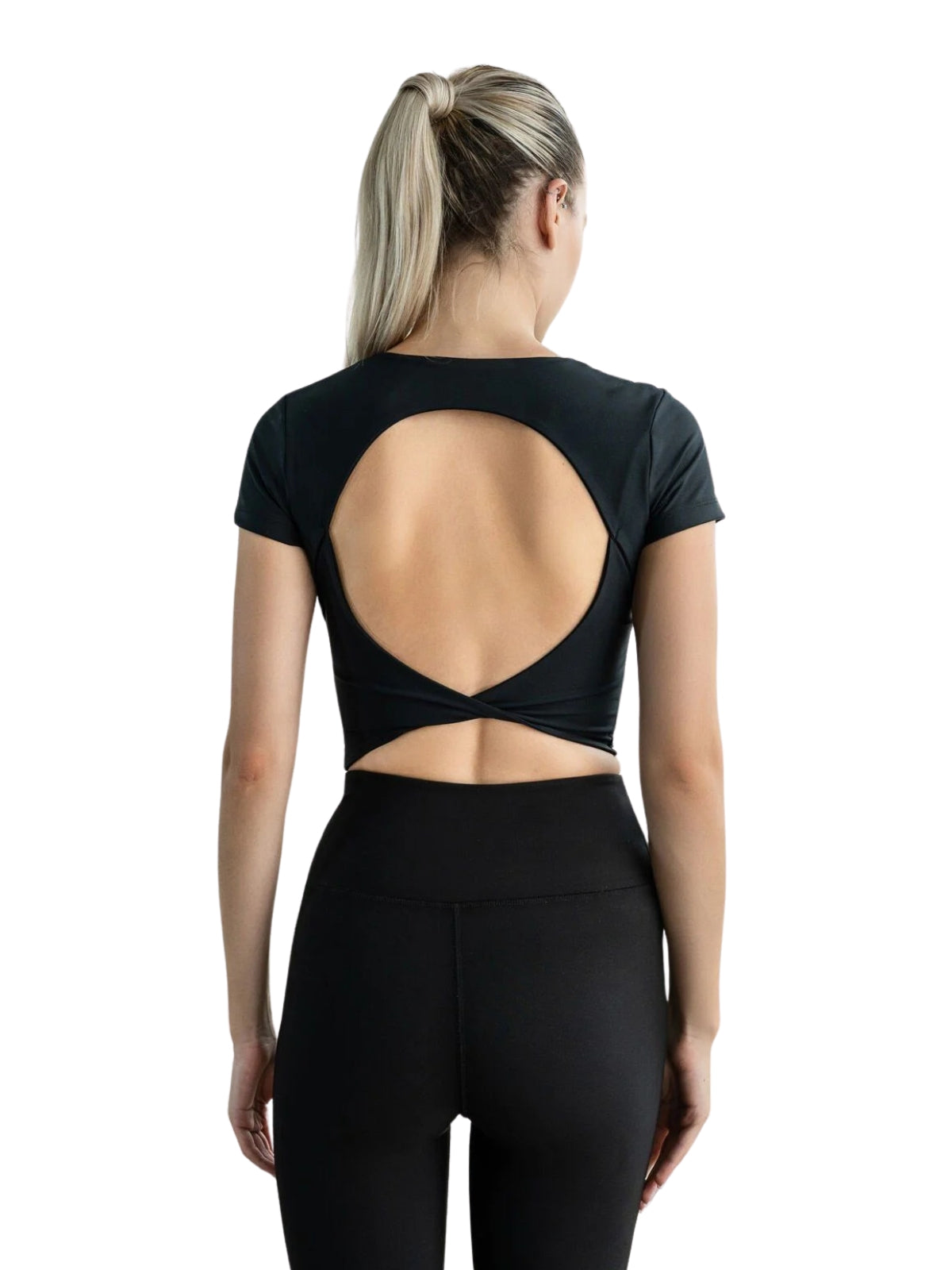 Person trägt Lisminas 093 Larissa Sport Top in Schwarz und Leggings, offenes Rückendesign, Haare zu einem Pferdeschwanz gebunden.