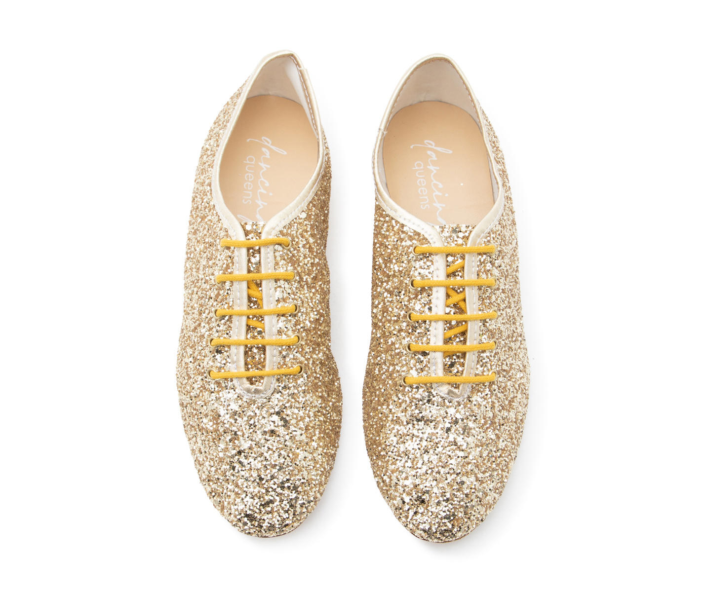 Flow Tanzschuhe in Gold Glitter von Dancing Queens mit flexibler Wildledersohle, Ansicht von oben auf weißem Hintergrund.