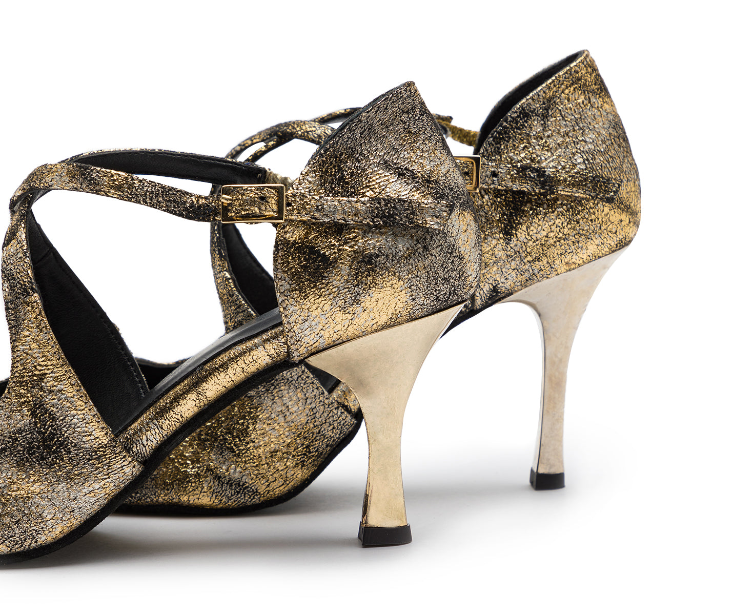 Orion Tanzschuhe in Gold von Dancing Queens mit Schleifen, schwarzen Riemchen und metallischen Stilettoabsätzen für Tänzerinnen.