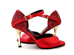 Alya Tanzschuhe in Rot Glitter von Dancing Queens mit Fesselriemchen und goldenem Absatz auf weißem Hintergrund.