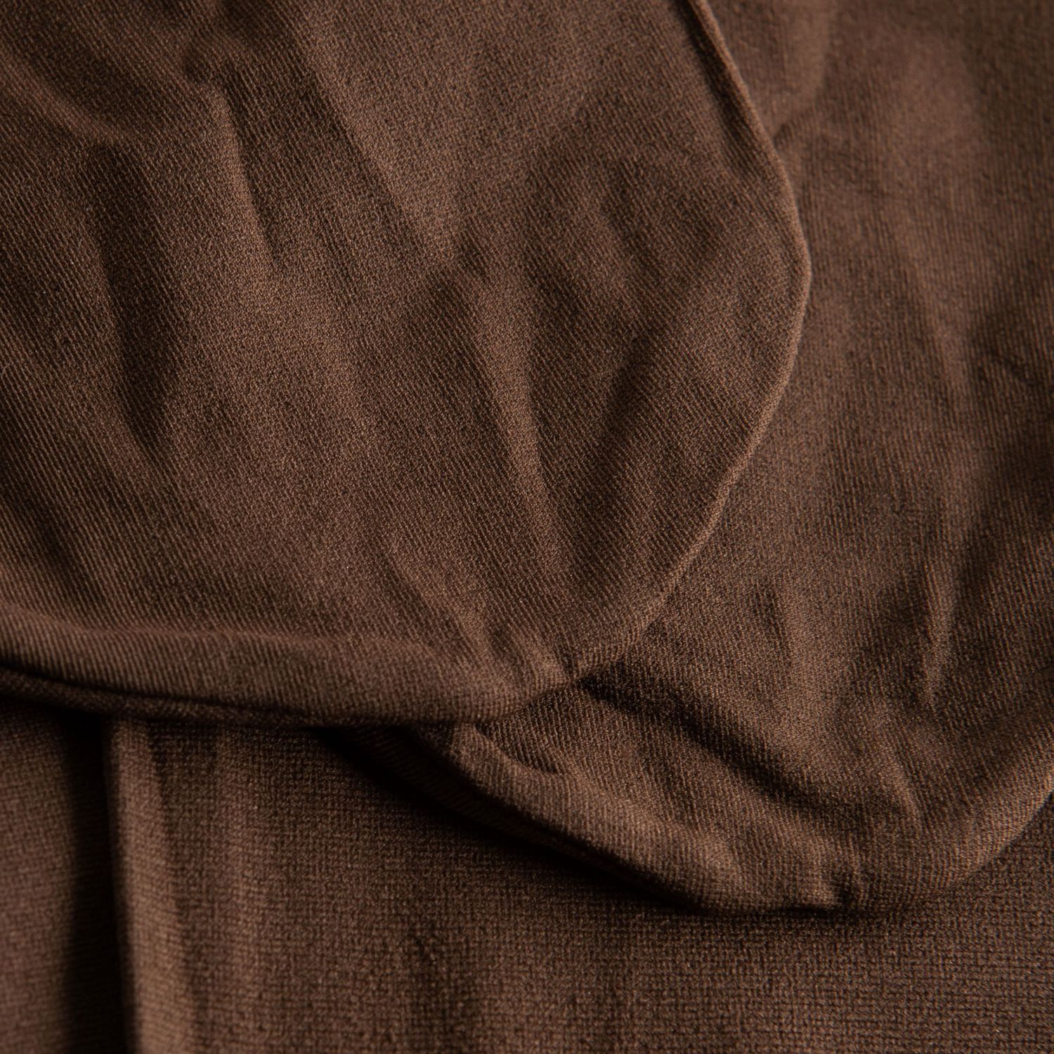 Nahaufnahme der 108 Economy Ballettstrumpfhose in Marron von Rumpf, mit sichtbarer Struktur und leichten Falten.