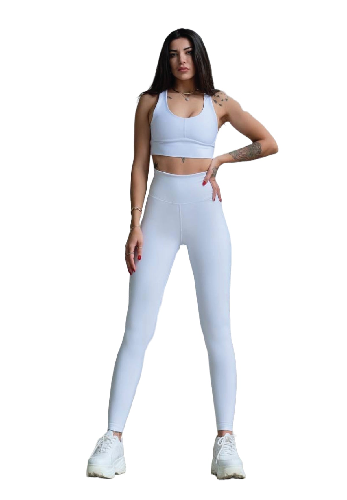 Frau in weißer Sportkleidung und Lisminas 314 Winter High Waist Leggings in Weiss, steht mit an den Seiten hängenden Armen.