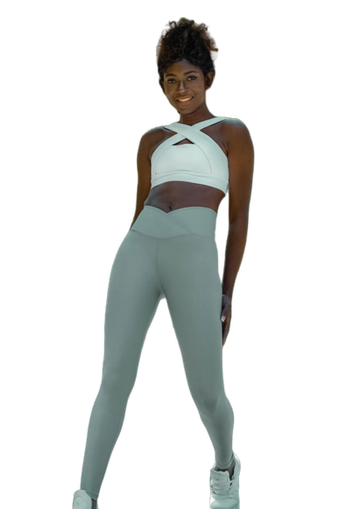 Person in einem weißen bauchfreien Top und Lismina 1098 Ve Waist Leggings in Wassergrün, die selbstbewusst vor einem weißen Hintergrund posiert.